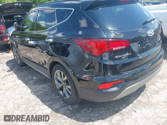 2017 Hyundai Santa Fe Ultimate with VIN 5NMZW4LA1HH052430, listed as a IAAI auction lot 42205489 with 85,720 mi miles and . Bid and sale history available at DreamBid. Image 3.