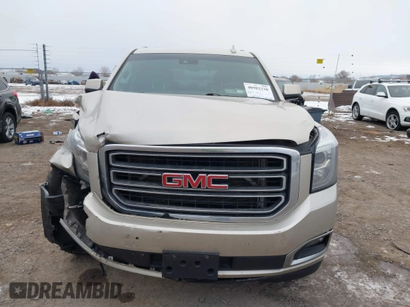 2015 GMC Yukon SLT z VIN 1GKS2BKC6FR655777, wystawiony jako IAAI lot #40982330 z przebiegiem 120 627 mil mil oraz . Historia ofert i sprzedaży dostępna na DreamBid. Obrazek 13.