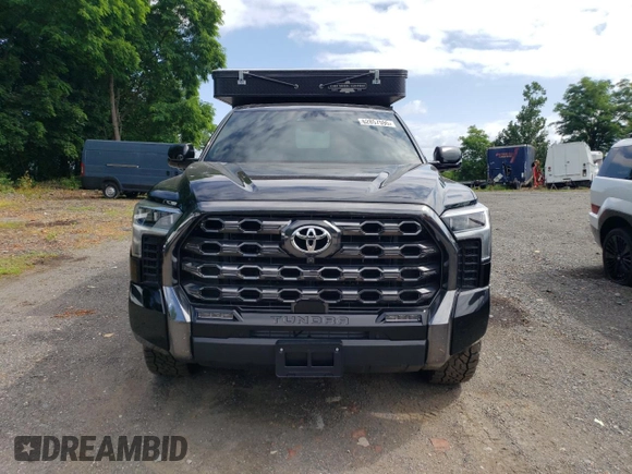 2023 Toyota Tundra Platinum with VIN 5TFNA5EC3PX017198, listed as a Copart auction lot 62857595 with 16,571 mi miles and Salvage title. Bid and sale history available at DreamBid. Image 5.
