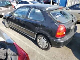 1997 Honda Civic DX with VIN 2HGEJ6344VH119405, listed as a Copart auction lot 71070544 with 26,621 mi miles and Salvage Title. Bid and sale history available at carsss.com. Image 2.