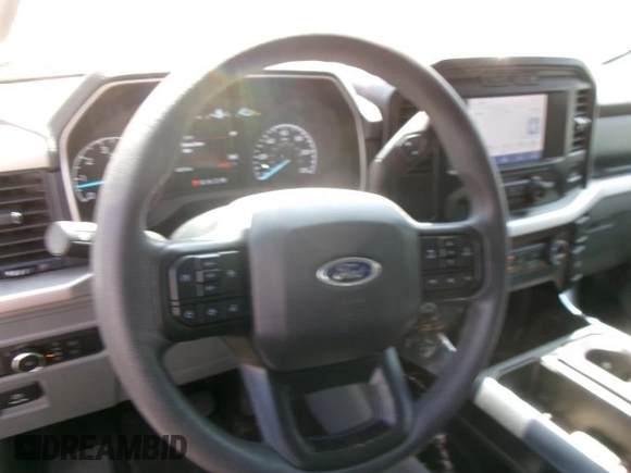 2021 Ford F-150 XL with VIN 1FTFW1E83MKF00953, listed as a IAAI auction lot 42199839 with 66,757 mi miles. Bid and sale history available at carsss.com. Image 1.