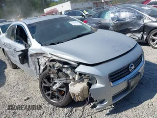 2014 Nissan Maxima S with VIN 1N4AA5AP2EC908715, listed as a IAAI auction lot 41977233 with 183,930 mi miles and . Bid and sale history available at DreamBid. Image 1.