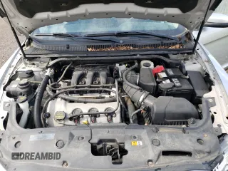 2011 Ford Taurus SEL z VIN 1FAHP2EW3BG119538, wystawiony jako Copart lot #54734985 z przebiegiem 53 753 mil mil oraz Szkoda całkowita • Salvage title. Historia ofert i sprzedaży dostępna na DreamBid. Obrazek 11.