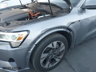 2023 Audi e-tron Premium with VIN WA1AAAGE9PB025769, listed as a IAAI auction lot 41629625 with 14,143 mi miles. Bid and sale history available at carsss.com. Image 12.