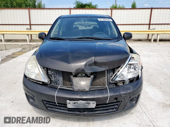 2010 Nissan Versa S with VIN 3N1BC1CP1AL460502, listed as a Copart auction lot 61106935 with 217,945 mi miles and Salvage title. Bid and sale history available at DreamBid. Image 5.