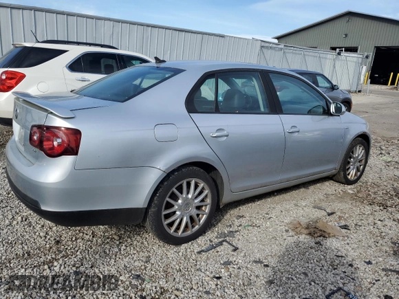 2008 Volkswagen Jetta Wolfsburg Edition z VIN 3VWRJ71K98M189900, wystawiony jako Copart lot #77866404 z przebiegiem 143 209 mil mil oraz Czysty tytuł • Clean title. Historia ofert i sprzedaży dostępna na DreamBid. Obrazek 3.