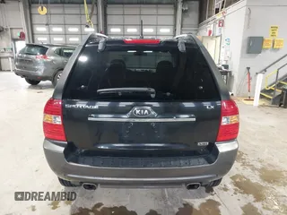2007 Kia Sportage LX z VIN KNDJE723177439778, wystawiony jako IAAI lot #42279004 z przebiegiem 198 994 mil mil oraz . Historia ofert i sprzedaży dostępna na DreamBid. Obrazek 16.