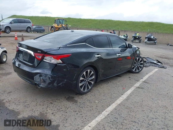 2016 Nissan Maxima SV z VIN 1N4AA6AP8GC408857, wystawiony jako IAAI lot #41892425 z przebiegiem 185 487 mil mil oraz . Historia ofert i sprzedaży dostępna na DreamBid. Obrazek 4.