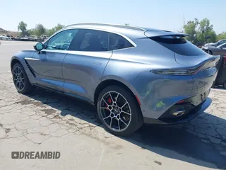 2021 Aston Martin DBX z VIN SCFVUJAW8MTV02568, wystawiony jako IAAI lot #42183964 z przebiegiem 53 608 mil mil oraz . Historia ofert i sprzedaży dostępna na DreamBid. Obrazek 3.