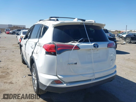2016 Toyota RAV4 LE with VIN 2T3ZFREV2GW291072, listed as a IAAI auction lot 41831444 with 135,820 mi miles. Bid and sale history available at carsss.com. Image 3.