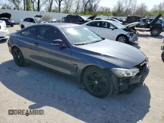 2015 BMW 4 Series 428i with VIN WBA3N3C55FK233471, listed as a Copart auction lot 51996865 with 129,520 mi miles and Salvage title. Bid and sale history available at DreamBid. Image 4.