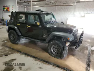 2008 Jeep Wrangler Unlimited X с VIN 1J4GA39128L632897, выставлен на аукционе Copart как лот 55282115 с пробегом 167 844 миль миль и Списание • Salvage title. История ставок и продаж доступна на DreamBid. Изображение 4.