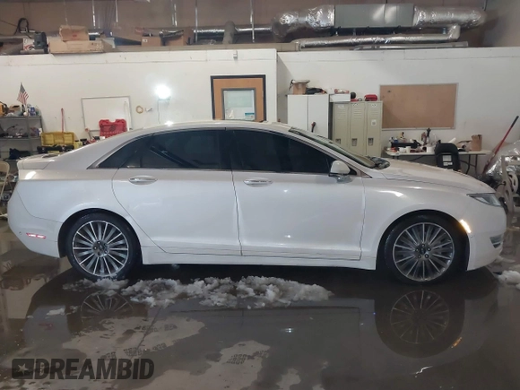 2014 Lincoln MKZ with VIN 3LN6L2J92ER836146, listed as a IAAI auction lot 41583343 with 130,613 mi miles. Bid and sale history available at carsss.com. Image 14.