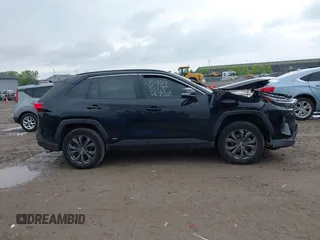 2023 Toyota RAV4 Hybrid XLE Premium with VIN 4T3B6RFV6PU126643, listed as a IAAI auction lot 42324990 with 31,491 mi miles and . Bid and sale history available at DreamBid. Image 13.