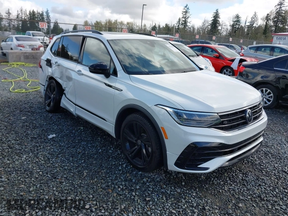 2023 Volkswagen Tiguan SE R-Line Black with VIN 3VVCB7AX3PM014446, listed as a IAAI auction lot 42016885 with 12,726 mi miles and . Bid and sale history available at DreamBid. Image 1.