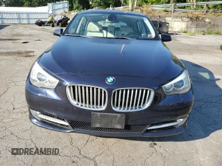 2012 BMW 5 Series GT 550i xDrive with VIN WBASP4C54CC899853, listed as a Copart auction lot 62847714 with 141,034 mi miles and Salvage Title. Bid and sale history available at carsss.com. Image 5.