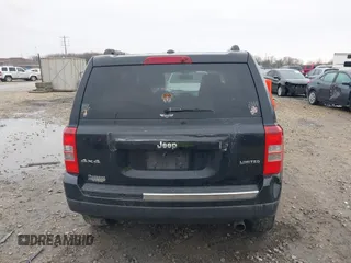 2014 Jeep Patriot Limited with VIN 1C4NJRCB7ED569805, listed as a IAAI auction lot 40854840 with 189,858 mi miles. Bid and sale history available at carsss.com. Image 16.