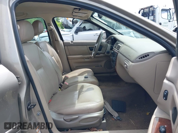 2004 Mercury Sable LS Premium z VIN 1MEHM59S34A626679, wystawiony jako IAAI lot #42364055 z przebiegiem 98 760 mil mil oraz . Historia ofert i sprzedaży dostępna na DreamBid. Obrazek 5.