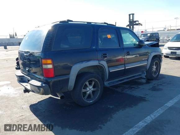 2002 Chevrolet Tahoe Z71 with VIN 1GNEK13TX2R324834, listed as a IAAI auction lot 41298063 with 1 mi miles. Bid and sale history available at carsss.com. Image 4.