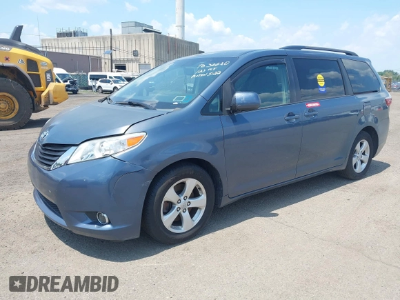 2015 Toyota Sienna LE AAS with VIN 5TDKK3DC1FS642029, listed as a IAAI auction lot 42618738 with 201,344 mi miles and . Bid and sale history available at DreamBid. Image 2.