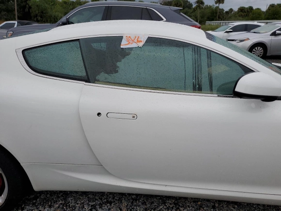 2011 Aston Martin DB9 with VIN SCFFDAAE8BGA13186, listed as a Copart auction lot 74703544 with 0 mi miles and Salvage Title. Bid and sale history available at carsss.com. Image 12.