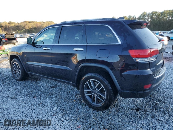 2020 Jeep Grand Cherokee Limited with VIN 1C4RJFBG8LC194474, listed as a Copart auction lot 82204104 with 100,710 mi miles and Salvage title. Bid and sale history available at DreamBid. Image 2.