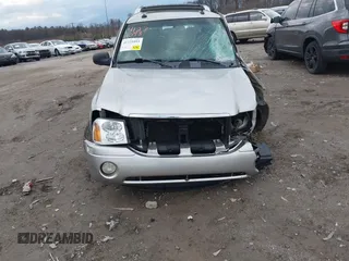 2004 GMC Envoy SLT with VIN 1GKET12S946177171, listed as a IAAI auction lot 41231093 with 182,574 mi miles and . Bid and sale history available at DreamBid. Image 6.