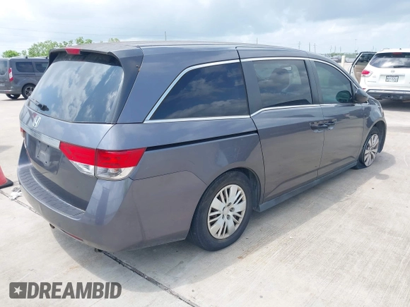 2016 Honda Odyssey LX with VIN 5FNRL5H27GB003250, listed as a IAAI auction lot 42103335 with 151,516 mi miles and . Bid and sale history available at DreamBid. Image 4.
