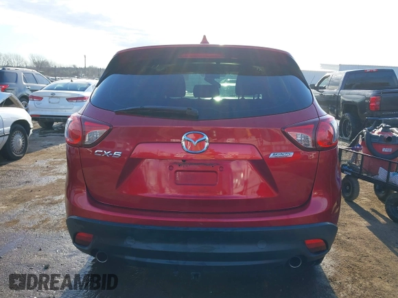 2015 Mazda CX-5 Sport z VIN JM3KE2BE7F0516869, wystawiony jako IAAI lot #41866488 z przebiegiem 131 237 mil mil oraz . Historia ofert i sprzedaży dostępna na DreamBid. Obrazek 16.