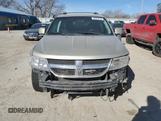 2010 Dodge Journey SXT with VIN 3D4PH5FV5AT169610, listed as a Copart auction lot 49323215 with 243,471 mi miles and Salvage Title. Bid and sale history available at carsss.com. Image 5.