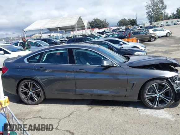 2018 BMW 4 Series 440i with VIN WBA4J5C51JBF07174, listed as a IAAI auction lot 41532904 with 63,745 mi miles and . Bid and sale history available at DreamBid. Image 14.