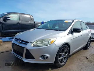 2013 Ford Focus SE with VIN 1FADP3K27DL203880, listed as a IAAI auction lot 41951733 with 131,880 mi miles. Bid and sale history available at carsss.com. Image 2.