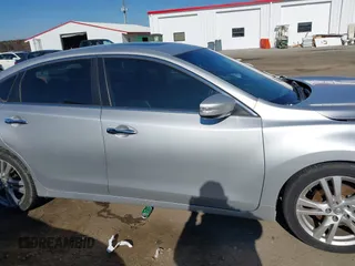 2013 Nissan Altima SL with VIN 1N4BL3AP5DC117077, listed as a IAAI auction lot 40982046 with 141,962 mi miles and . Bid and sale history available at DreamBid. Image 13.