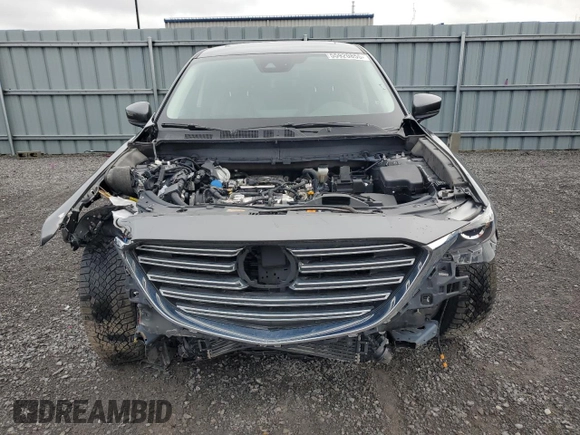 2023 Mazda CX-9 Touring with VIN JM3TCBCY4P0654597, listed as a Copart auction lot 55920855 with 58,534 mi miles and Salvage title. Bid and sale history available at DreamBid. Image 5.