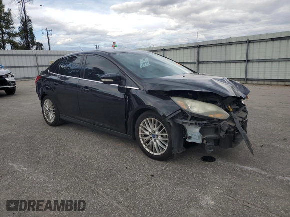 2014 Ford Focus Titanium with VIN 1FADP3J22EL221898, listed as a Copart auction lot 47867325 with 97,806 mi miles and Salvage Title. Bid and sale history available at DreamBid. Image 4.