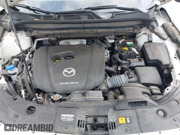 2020 Mazda CX-5 Touring z VIN JM3KFBCM2L0786784, wystawiony jako IAAI lot #42127457 z przebiegiem 62 665 mil mil oraz . Historia ofert i sprzedaży dostępna na DreamBid. Obrazek 10.