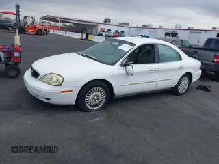 2002 Mercury Sable GS z VIN 1MEFM50U12G628060, wystawiony jako IAAI lot #42072436 z przebiegiem 139 336 mil mil oraz . Historia ofert i sprzedaży dostępna na DreamBid. Obrazek 6.