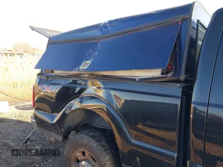 2012 Ford F-250 XL with VIN 1FT7X2B65CEB14851, listed as a IAAI auction lot 41464290 with 214,284 mi miles and . Bid and sale history available at DreamBid. Image 6.