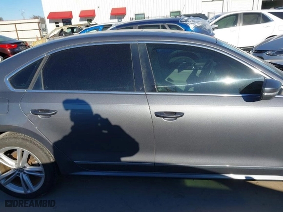 2015 Volkswagen Passat 2.0L TDI SEL Premium with VIN 1VWCV7A34FC034494, listed as a IAAI auction lot 41254799 with 102,881 mi miles. Bid and sale history available at carsss.com. Image 14.