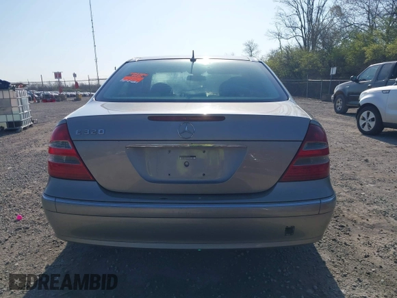 2003 Mercedes-Benz E-Class 3.2L with VIN WDBUF65J93X099223, listed as a IAAI auction lot 42033473 with 230,758 mi miles. Bid and sale history available at carsss.com. Image 16.