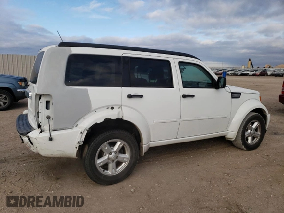 2011 Dodge Nitro SXT with VIN 1D4PU5GK5BW568240, listed as a Copart auction lot 84461784 with 101,246 mi miles and Salvage Title. Bid and sale history available at DreamBid. Image 3.