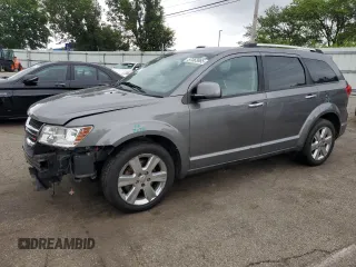 2012 Dodge Journey Crew with VIN 3C4PDDDG6CT275610, listed as a Copart auction lot 57063865 with 126,319 mi miles and Salvage title. Bid and sale history available at DreamBid. Image 1.