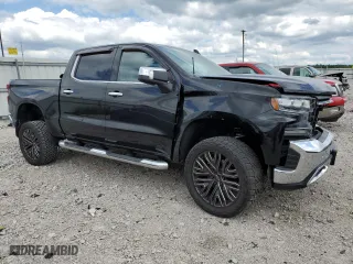 2019 Chevrolet Silverado 1500 LTZ with VIN 1GCUYGEL7KZ124884, listed as a Copart auction lot 58082934 with 124,904 mi miles and Salvage Title. Bid and sale history available at carsss.com. Image 4.