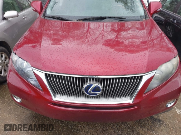 2010 Lexus RX 450h with VIN JTJZB1BA0A2001438, listed as a IAAI auction lot 41929519 with 212,730 mi miles and . Bid and sale history available at DreamBid. Image 6.