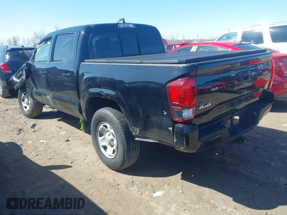 2023 Toyota Tacoma SR with VIN 3TMCZ5AN9PM555191, listed as a IAAI auction lot 41935645 with 31,580 mi miles and . Bid and sale history available at DreamBid. Image 3.