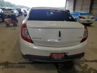 2013 Lincoln MKS z VIN 1LNHL9DK4DG613144, wystawiony jako Copart lot #54354625 z przebiegiem 104 211 mil mil oraz Szkoda całkowita • Salvage title. Historia ofert i sprzedaży dostępna na DreamBid. Obrazek 6.