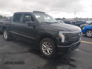 2023 Ford F-150 Lightning Pro with VIN 1FT6W1EV3PWG08587, listed as a IAAI auction lot 42418036 with Not provided miles and . Bid and sale history available at DreamBid. Image 1.