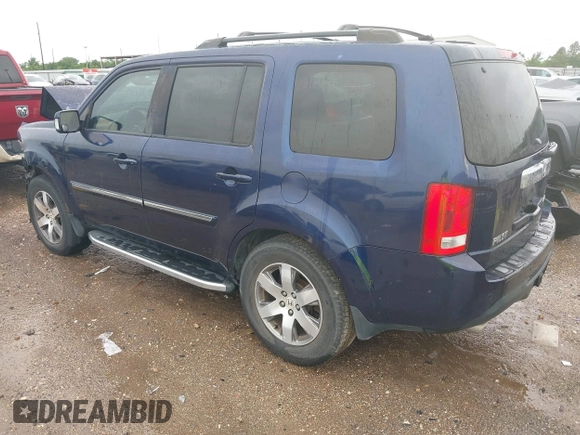 2013 Honda Pilot Touring with VIN 5FNYF4H95DB007125, listed as a IAAI auction lot 42493693 with Not provided miles and . Bid and sale history available at DreamBid. Image 3.