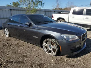 2015 BMW 7 Series 750Li with VIN WBAYE8C53FD782173, listed as a Copart auction lot 41584115 with 114,986 mi miles and Clean Title. Bid and sale history available at carsss.com. Image 4.