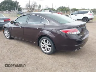 2009 Mazda 6 S Grand Touring with VIN 1YVHP82B595M07978, listed as a IAAI auction lot 41509734 with 209,834 mi miles and . Bid and sale history available at DreamBid. Image 3.